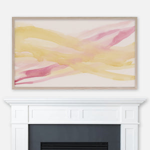 Abstract pink and yellow watercolor washes painting displayed full screen in Samsung Frame TV above fireplace