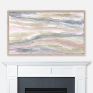 Gray blush and beige abstract watercolor painting displayed in Samsung Frame TV above fireplace