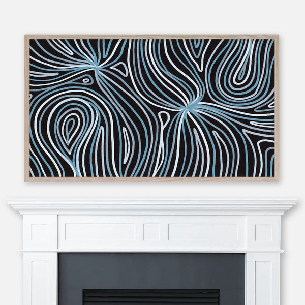 Blue and black abstract line swirl pattern painting displayed in Samsung Frame TV above fireplace
