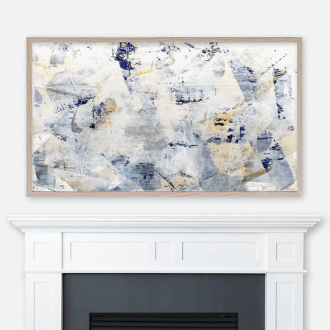 Navy blue and gold abstract painting displayed in Samsung Frame TV above fireplace