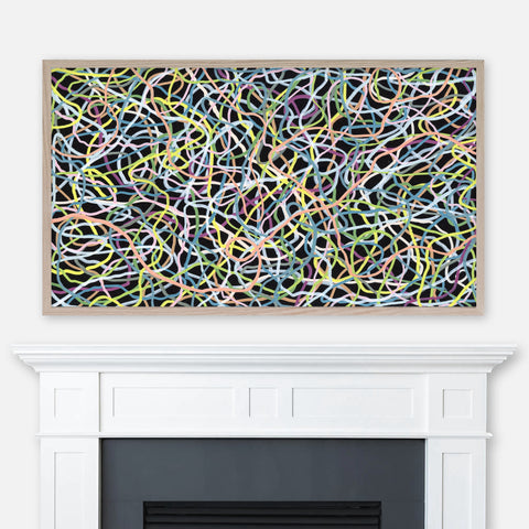 Colorful abstract line pattern graffiti painting displayed in Samsung Frame TV above fireplace