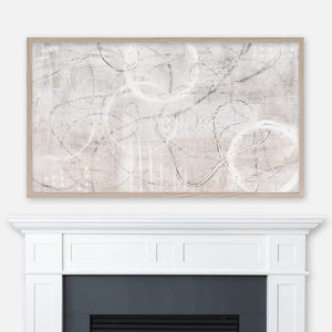 Neutral beige gray white modern abstract painting displayed in Samsung Frame TV above fireplace