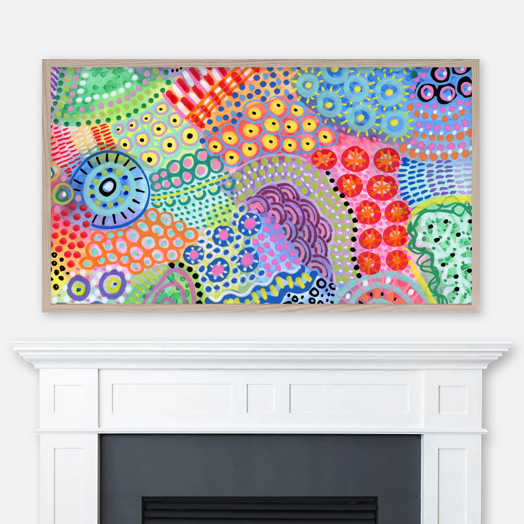 Colorful abstract intuitive painting displayed full screen in Samsung Frame TV above fireplace