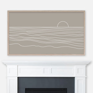 Neutral greige and white beach sunset line artwork displayed full screen in Samsung Frame TV above fireplace
