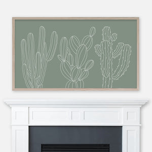Sage green and white line art of three cactus plants displayed full screen in Samsung Frame TV above fireplace