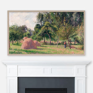 Painting Haystacks Morning Éragny by Camille Pissarro displayed full screen in Samsung Frame TV above fireplace