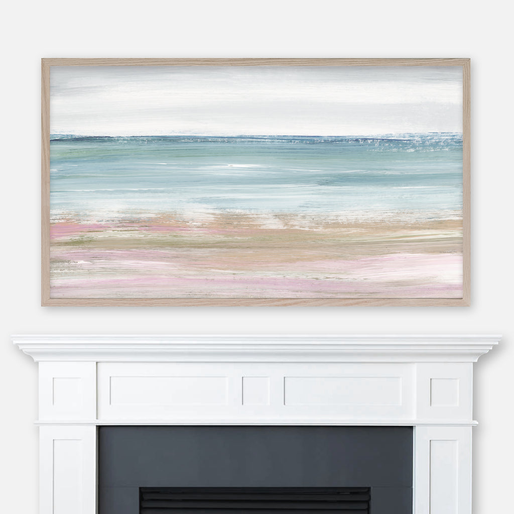 Turquoise pink and beige abstract beach landscape painting displayed in Samsung Frame TV above fireplace