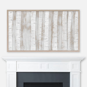 Neutral gray beige and white abstract aspen trees painting displayed in Samsung Frame TV above fireplace