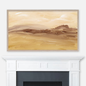 Beige and brown abstract desert landscape painting displayed full screen in Samsung Frame TV above fireplace