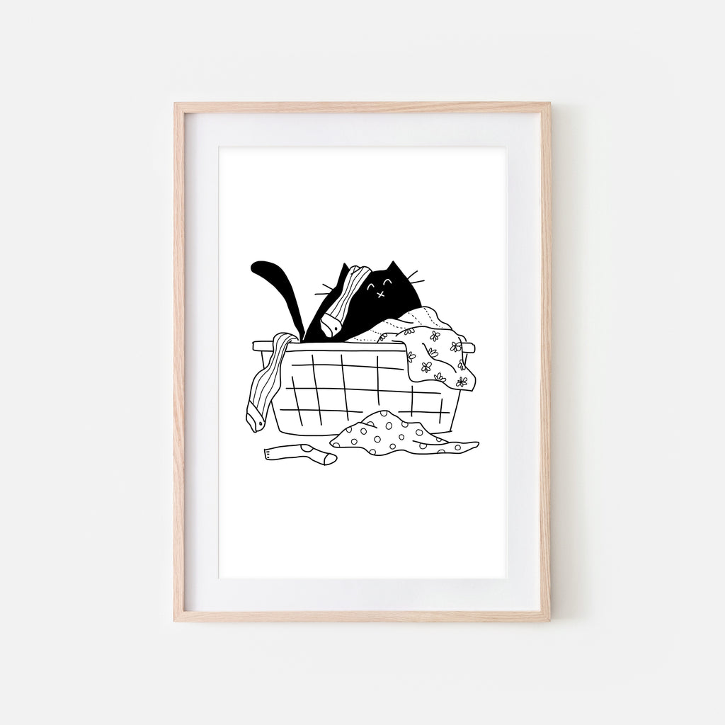 https://happycatprints.com/cdn/shop/products/Messy-Laundry-Basket-Black-Cat-Wall-Art-Laundry-Room-Decor-Black-and-White-Line-Drawing-Digital-Print-Printable-Download-Vertical_1024x1024.jpg?v=1639775311