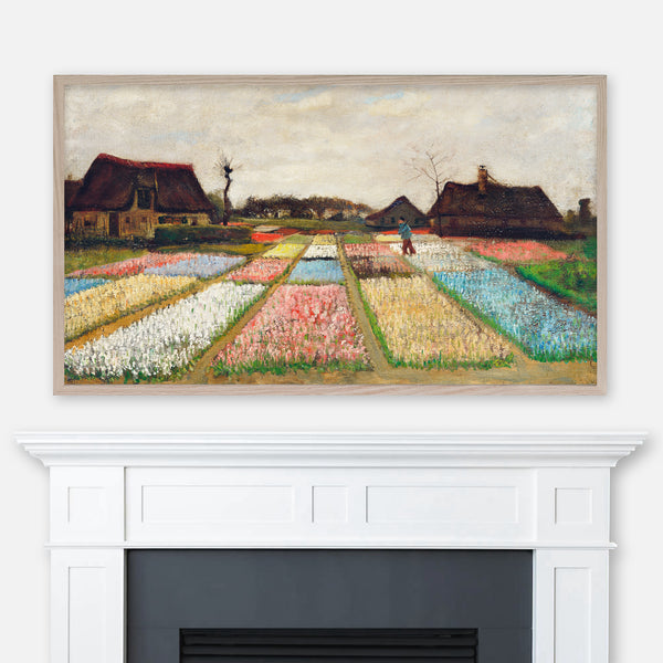 Painting Flower Beds in Holland by Vincent Van Gogh displayed full screen in Samsung Frame TV above fireplace