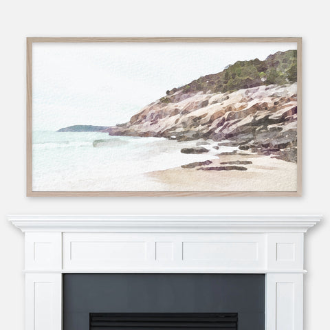Coastal Maine watercolor landscape painting displayed full screen in Samsung Frame TV above fireplace