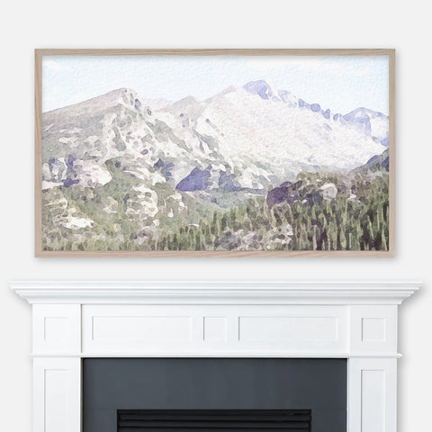Watercolor Colorado Rocky Mountains landscape painting displayed full screen in Samsung Frame TV above fireplace