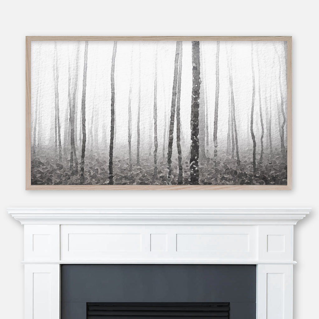Black and white watercolor landscape painting of a misty leafless tree forest displayed in Samsung Frame TV above fireplace