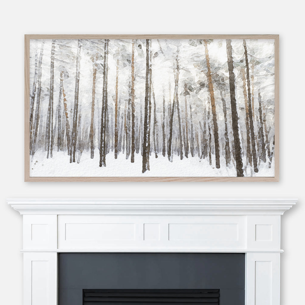 Watercolor winter landscape painting of a forest of tall pine trees in snow displayed in Samsung Frame TV above fireplace