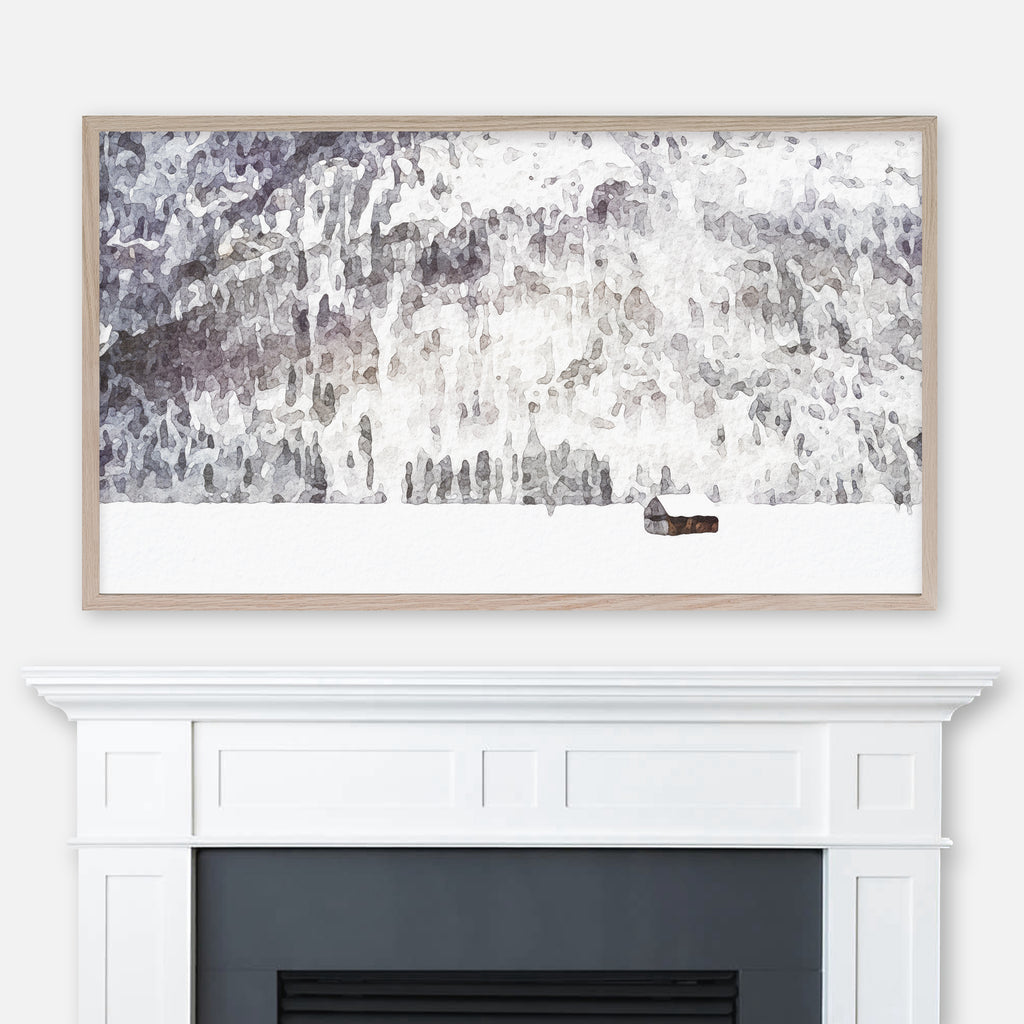 Watercolor winter landscape painting of a snowy cabin at the foot of a wooded mountain displayed in Samsung Frame TV above fireplace