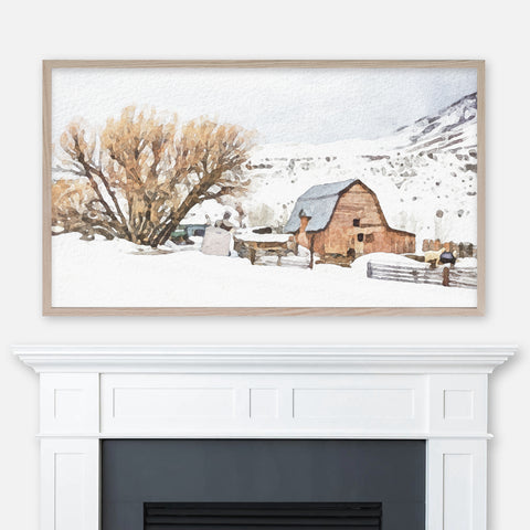 Watercolor winter landscape painting of a mountain barn and farmstead in the snow displayed in Samsung Frame TV above fireplace